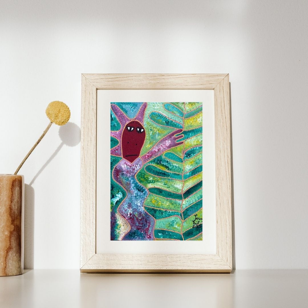 Feylumba by Levoy Exil, shown framed in a home interior