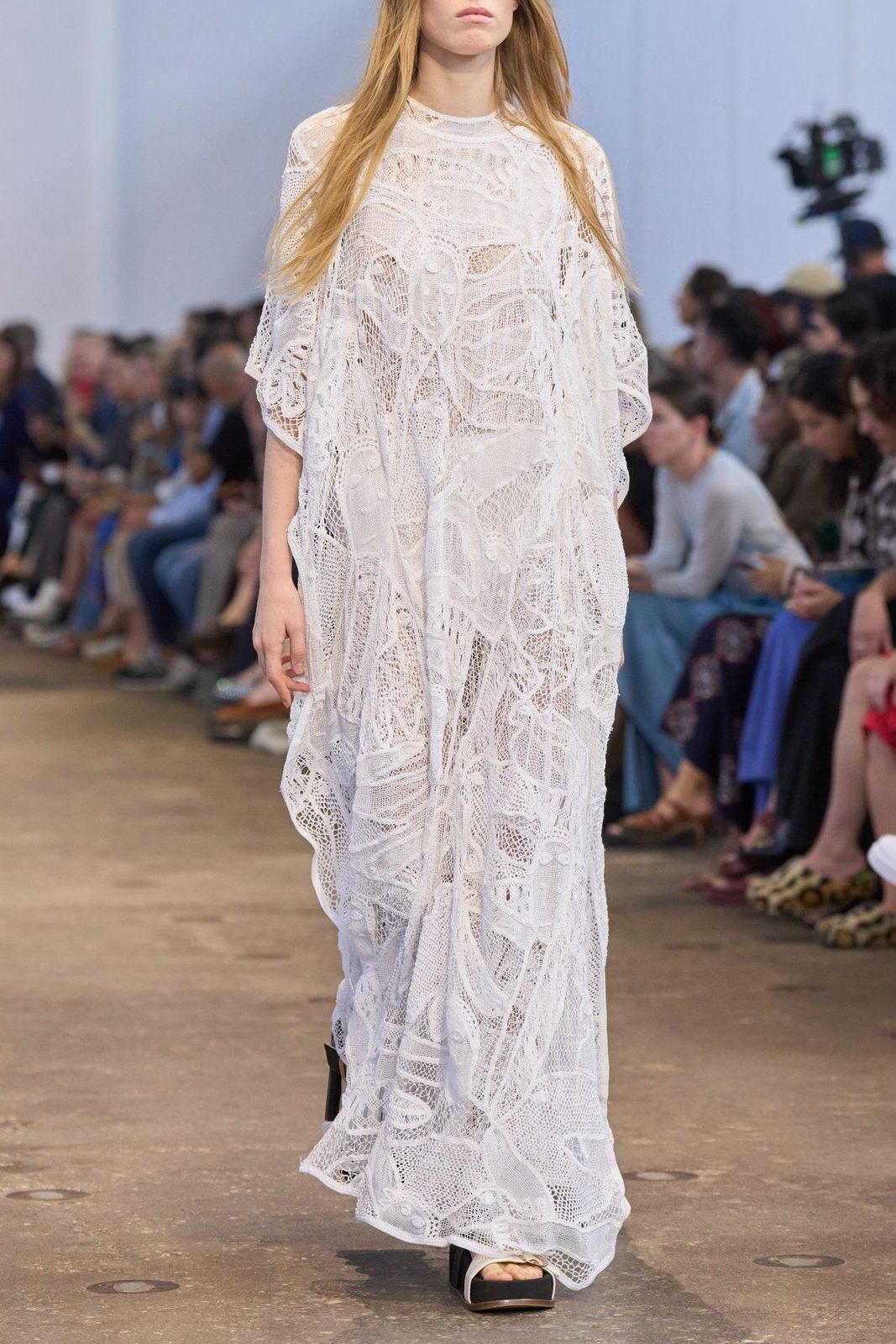 Model in the white Solrou-inspired gown on the Gabriela Hearst Spring Summer 2024 runway